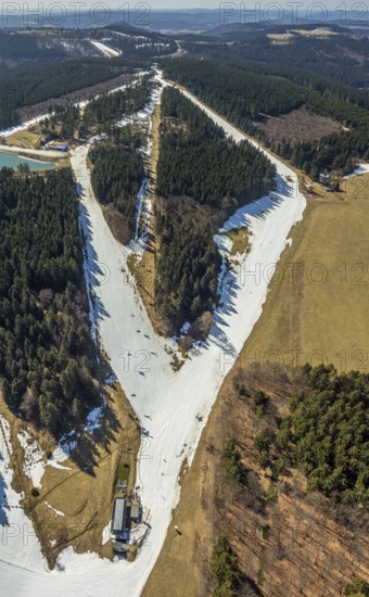 Chairlift mountain station Büre, Winterberg, Sauerland, North Rhine-Westphalia, Germany, DE, Europe, distant view, hilly landscape, aerial view, aerial photo, aerial photography, aerial photography, pandemic lockdown, snow remains, chairlift, ski lift, overview, bird's eye view, winter, birds-eyes view, overview