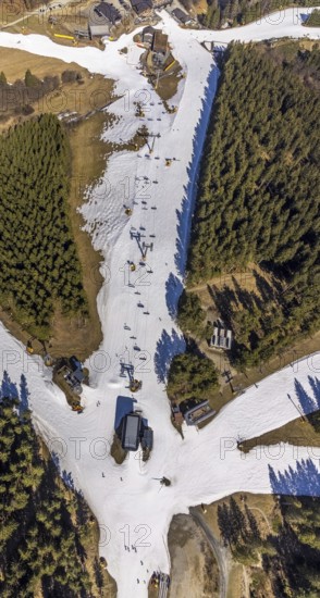 Poppenberg mountain station and chairlift, Winterberg, Sauerland, North Rhine-Westphalia, Germany, DE, Europe, aerial view, aerial photography, aerial photography, pandemic lockdown, snow remains, chairlift, ski lift, overview, circulating cable car, bird's eye view, winter, birds-eyes view, overview