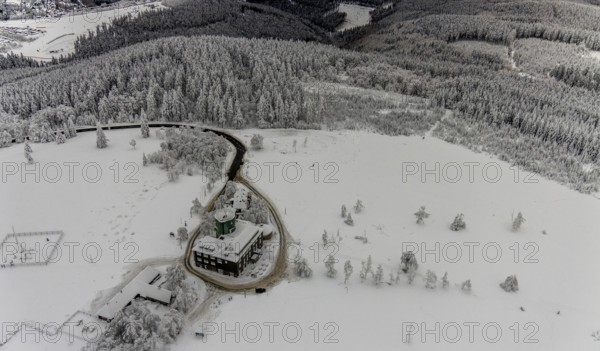 Aerial view of the snowy winter landscape of Winterberg am Kahlen Asten with Astenturm during Corona times in Sauerland in North Rhine-Westphalia, Germany, Sauerland, Europe, aerial view, birds-eyes view, aerial photography, aerial photography, overview, bird's eye view, lockdown, closed winter landscape, corona lockdown, deserted, snow, winter weather, corona-related lockdown, high heath in winter