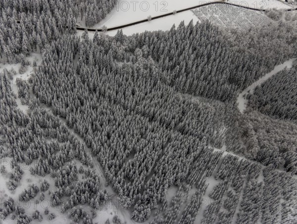 Aerial view of the snowy winter landscape of Winterberg with winding roads and paths in the Sauerland in North Rhine-Westphalia, Germany, Sauerland, Europe, aerial photo, birds-eyes view, aerial photography, aerial photography, overview, bird's eye view, lockdown, closed winter landscape, corona lockdown, deserted, snow, winter weather, corona-related lockdown