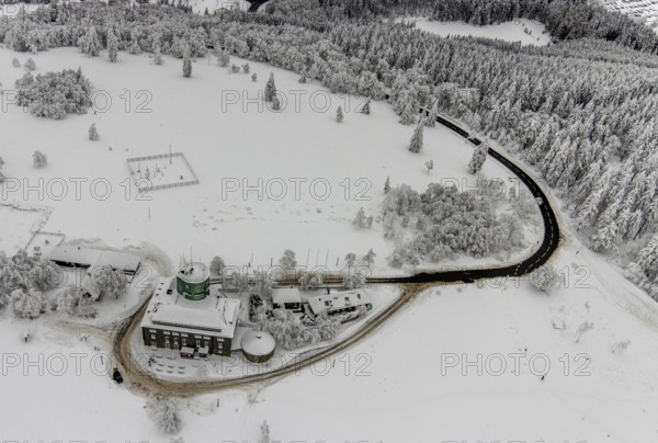Aerial view of the snowy winter landscape of Winterberg am Kahlen Asten with Astenturm during Corona times in Sauerland in North Rhine-Westphalia, Germany, Sauerland, Europe, aerial view, birds-eyes view, aerial photography, aerial photography, overview, bird's eye view, lockdown, closed winter landscape, corona lockdown, deserted, snow, winter weather, corona-related lockdown, high heath in winter