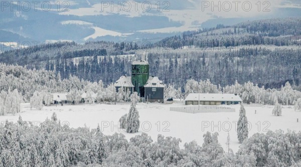 Aerial view of the snowy winter landscape of Winterberg am Kahlen Asten with Astenturm during Corona times in Sauerland in North Rhine-Westphalia, Germany, Sauerland, Europe, aerial view, birds-eyes view, aerial photography, aerial photography, overview, bird's eye view, lockdown, closed winter landscape, corona lockdown, deserted, snow, winter weather, corona-related lockdown, high heath in winter