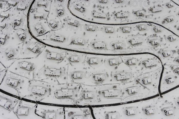 Aerial view of the snowy winter landscape of Winterberg with the deserted Landal Winterberg holiday resort in the Corona Lockdown in Sauerland in North Rhine-Westphalia, Germany, Sauerland, Europe, aerial photo, birds-eyes view, aerial photography, aerial photography, overview, bird's eye view, lockdown, closed winter landscape, corona lockdown, deserted, snow, winter weather, corona-related lockdown