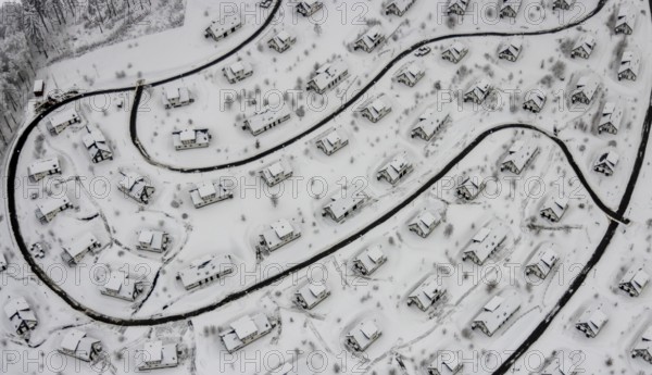 Aerial view of the snowy winter landscape of Winterberg with the deserted Landal Winterberg holiday resort in the Corona Lockdown in Sauerland in North Rhine-Westphalia, Germany, Sauerland, Europe, aerial photo, birds-eyes view, aerial photography, aerial photography, overview, bird's eye view, lockdown, closed winter landscape, corona lockdown, deserted, snow, winter weather, corona-related lockdown