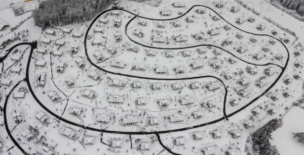 Aerial view of the snowy winter landscape of Winterberg with the deserted Landal Winterberg holiday resort in the Corona Lockdown in Sauerland in North Rhine-Westphalia, Germany, Sauerland, Europe, aerial photo, birds-eyes view, aerial photography, aerial photography, overview, bird's eye view, lockdown, closed winter landscape, corona lockdown, deserted, snow, winter weather, corona-related lockdown