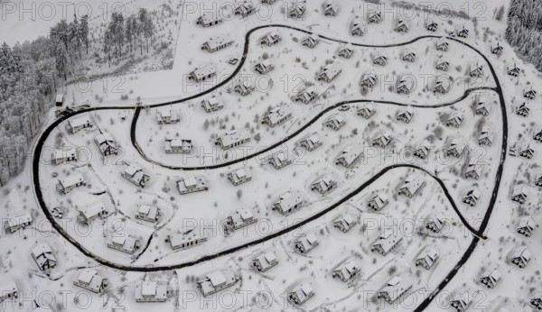 Aerial view of the snowy winter landscape of Winterberg with the deserted Landal Winterberg holiday resort in the Corona Lockdown in Sauerland in North Rhine-Westphalia, Germany, Sauerland, Europe, aerial photo, birds-eyes view, aerial photography, aerial photography, overview, bird's eye view, lockdown, closed winter landscape, corona lockdown, deserted, snow, winter weather, corona-related lockdown