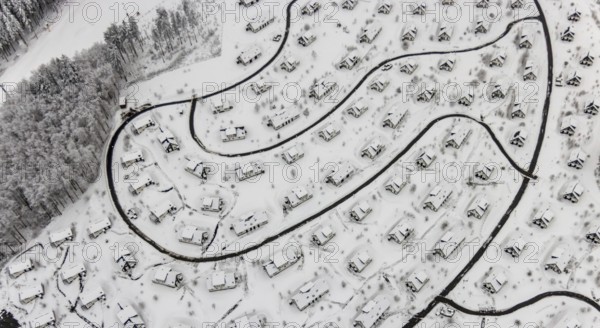 Aerial view of the snowy winter landscape of Winterberg with the deserted Landal Winterberg holiday resort in the Corona Lockdown in Sauerland in North Rhine-Westphalia, Germany, Sauerland, Europe, aerial photo, birds-eyes view, aerial photography, aerial photography, overview, bird's eye view, lockdown, closed winter landscape, corona lockdown, deserted, snow, winter weather, corona-related lockdown