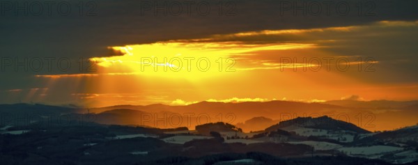 Aerial view of the sunset with a view over the snowy winter landscape from Winterberg to the Bergisches Land in Sauerland in North Rhine-Westphalia, Germany, Sauerland, Europe, aerial view, birds-eyes view, aerial photography, aerial photography, overview, bird's eye view, lockdown, closed winter landscape, corona lockdown, deserted, snow, winter weather, corona-related lockdown