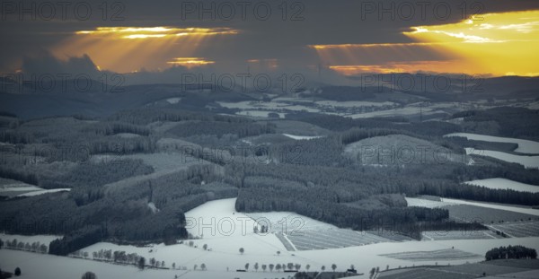 Aerial view of the sunset with a view over the snowy winter landscape from Winterberg to the Bergisches Land in Sauerland in North Rhine-Westphalia, Germany, Sauerland, Europe, aerial view, birds-eyes view, aerial photography, aerial photography, overview, bird's eye view, lockdown, closed winter landscape, corona lockdown, deserted, snow, winter weather, corona-related lockdown