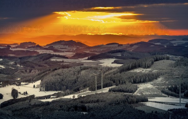 Aerial view of the sunset with a view over the snowy winter landscape from Winterberg to the Bergisches Land in Sauerland in North Rhine-Westphalia, Germany, Sauerland, Europe, aerial view, birds-eyes view, aerial photography, aerial photography, overview, bird's eye view, lockdown, closed winter landscape, corona lockdown, deserted, snow, winter weather, corona-related lockdown