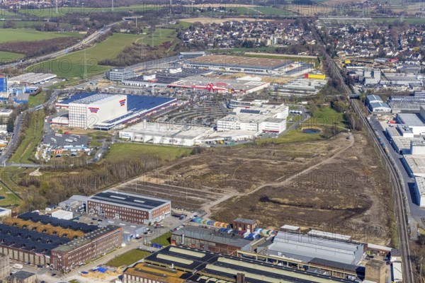 Aerial view, Stockumer Straße industrial estate, Wittener Industrie und Technologie Park, WITG, Annen brownfield site, industrial estate on Brauckstraße, Ostermann, Bauhaus, Amazon, Rüdinghausen, Witten, Ruhr area, North Rhine-Westphalia, Germany, Amazon logistics centre, Bauhaus Baumarkt, DE, Europe, commercial enterprises, commercial area, industrial estate, commercial park, commercial location, commercial use, freight traffic, industrial area, industrial location, logistics, logistics service, logistics service provider, logistics provider, logistics centre, aerial view, aerial photography, aerial photography, Ostermann Einrichtungs-Centrum, transport service, overview, bird's eye view, birds-eyes view, overview