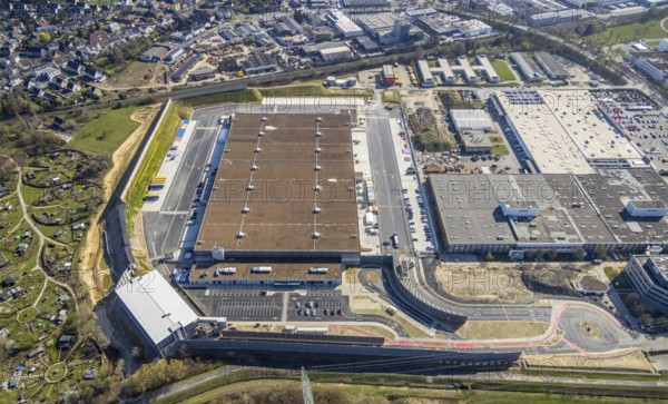 Aerial view, construction site new building Amazon logistics centre, industrial estate on Brauckstraße, allotment garden site Mellmausland, Rüdinghausen, Witten, Ruhr area, North Rhine-Westphalia, Germany, Amazon logistics centre, railway tracks, construction work, construction area, building site, building plots, construction measure, construction project, building site, DE, Ennepe-Ruhr district, development, Europe, community garden, commercial enterprises, commercial area, commercial park, commercial site, commercial use, freight traffic, industrial estate, industrial building, industrial site, allotment garden, allotment garden site, allotment garden association, allotment gardener association, logistics, logistics service, logistics provider, logistics centre, aerial view, aerial photography, aerial photography, Menglinghauser Straße, new build, parcel delivery, Salinger Feld, allotment garden, freight forwarding, transport, transport service, overview, bird's-eye view, overview