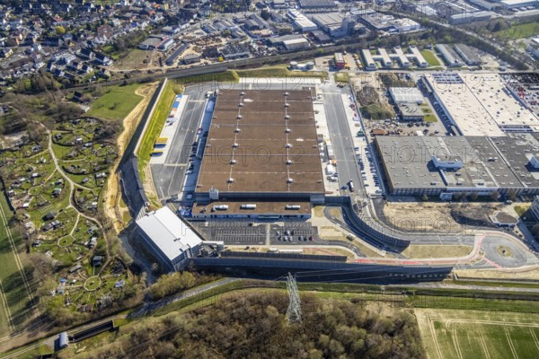 Aerial view, construction site new building Amazon logistics centre, industrial estate on Brauckstraße, allotment garden site Mellmausland, Rüdinghausen, Witten, Ruhr area, North Rhine-Westphalia, Germany, Amazon logistics centre, railway tracks, construction work, construction area, building site, building plots, construction measure, construction project, building site, DE, Ennepe-Ruhr district, development, Europe, community garden, commercial enterprises, commercial area, commercial park, commercial site, commercial use, freight traffic, industrial estate, industrial building, industrial site, allotment garden, allotment garden site, allotment garden association, allotment gardener association, logistics, logistics service, logistics provider, logistics centre, aerial view, aerial photography, aerial photography, Menglinghauser Straße, new build, parcel delivery, Salinger Feld, allotment garden, freight forwarding, transport, transport service, overview, bird's-eye view, overview