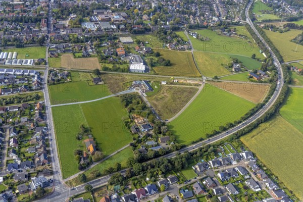 Aerial view, construction site and new construction of a kindergarten on Agnes-Neuhaus-Allee in the Hessenviertel in the Feldmark district of Wesel, Lower Rhine, North Rhine-Westphalia, Germany, construction work, construction area, building site, building plots, construction project, construction site, DE, Europe, kindergarten, day-care centre, day-care centre for children, aerial photograph, aerial photography, aerial photography, new construction, overview, bird's eye view, Wesel, birds-eyes view, overview