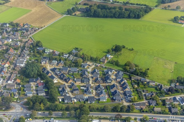 Aerial view, construction site and new construction of a housing estate Am Schwan in the district Lackhausen in Wesel, Lower Rhine, North Rhine-Westphalia, Germany, construction work, construction area, construction site, building plots, construction measure, construction project, construction site, DE, Europe, property tax, real estate, aerial view, aerial photography, aerial photography, new construction, overview, bird's eye view, Wesel, residential complex, living and living, residential area, residential buildings, residential quality, residential neighbourhood, residential estate, birds-eyes view, overview