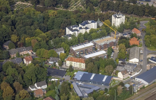 Aerial view, construction site and new construction of rental flats on Isselstraße in Wesel, Lower Rhine, North Rhine-Westphalia, Germany, construction work, construction area, construction site, building plots, construction crane, construction project, construction site, DE, Europe, property tax, real estate, aerial photograph, aerial photography, aerial photography, new construction, overview, bird's eye view, Wesel, residential complex, living and living, residential area, residential buildings, residential quality, residential neighbourhood, residential estate, birds-eyes view, overview