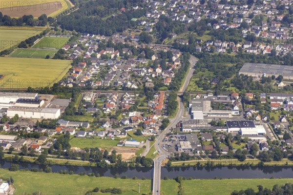 Aerial view, residential area Fröndenberger Straße with Ruhr bridge and river Ruhr, Wickede, Sauerland, North Rhine-Westphalia, Germany, DE, Europe, commercial enterprises, commercial area, commercial area, commercial location, commercial use, property tax, real estate, aerial view, aerial photography, aerial photography, overview, bird's-eye view, Wilhelm Humpert GmbH, residential area, living and living, residential area, residential buildings, residential quality, housing estate, birds-eyes view, overview