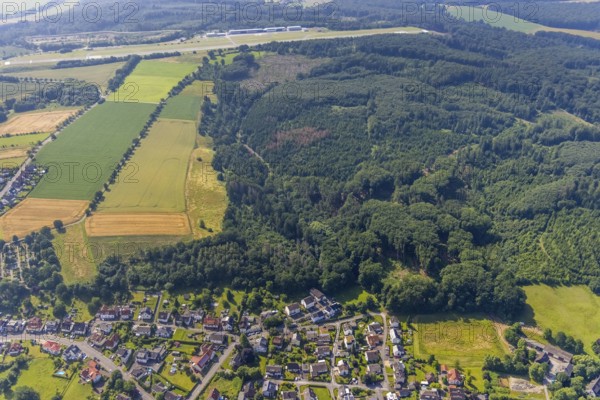 Aerial view, forest area Wetterberg Westerheide and town view Echthausen, Wickede, Sauerland, North Rhine-Westphalia, Germany, DE, Europe, aerial view, aerial photography, aerial photography, town view, town area, overview, bird's-eye view, overview