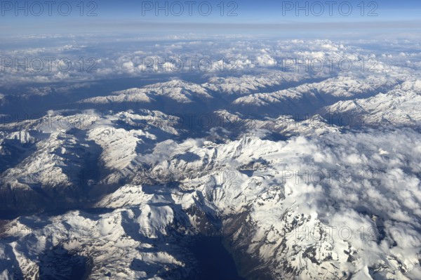 View from an altitude of 11000 metres to the Großglockner massif in the centre of the picture in the Eastern Alps, Tyrol and Carinthia, Austria