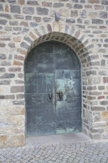 Door and entrance to the art museum with door handle by Heinrich Apel 1974, bronze sculptures, modern art decorations, metal door, Kloster Unser Lieben Frauen, Magdeburg, Romanesque Road, Saxony-Anhalt, Germany