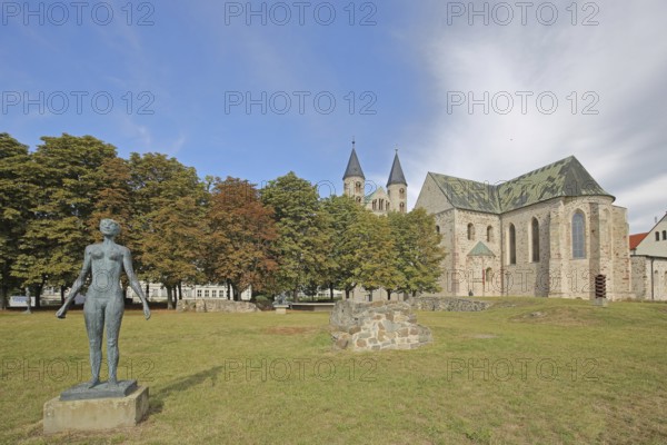 The Swimmer by Jenny Mucchi-Wiegmann 1968, modern art, bronze sculpture, life-size, standing female figure, Romanesque Church, Art Museum and Monastery of Our Lady with Twin Towers, Sculpture Park, Magdeburg, Romanesque Road, Saxony-Anhalt, Germany