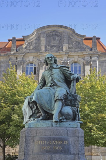 Otto von Guericke Fountain and monument to physicist Otto von Guericke, inscription, sculpture, New Town Hall, view from below, Hauptwache, Magdeburg, Saxony-Anhalt, Germany