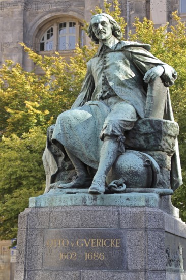 Otto von Guericke Fountain and monument to physicist Otto von Guericke, sculpture, inscription, Hauptwache, Magdeburg, Saxony-Anhalt, Germany