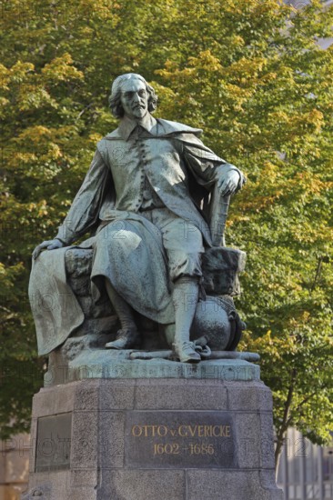Otto von Guericke Fountain and monument to physicist Otto von Guericke, sculpture, inscription, Hauptwache, Magdeburg, Saxony-Anhalt, Germany