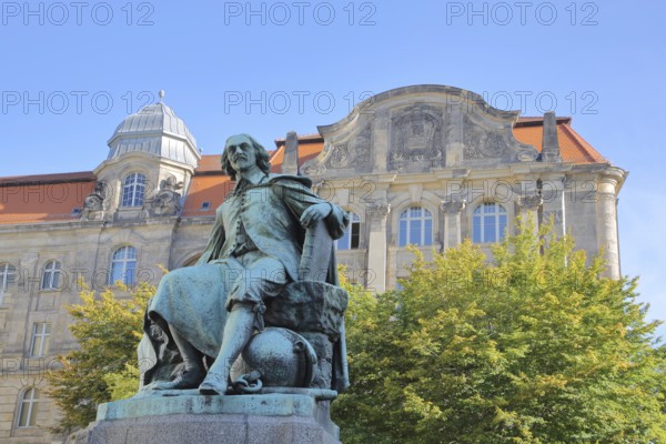 Otto von Guericke Fountain and monument to physicist Otto von Guericke, sculpture, New Town Hall, view from below, Hauptwache, Magdeburg, Saxony-Anhalt, Germany