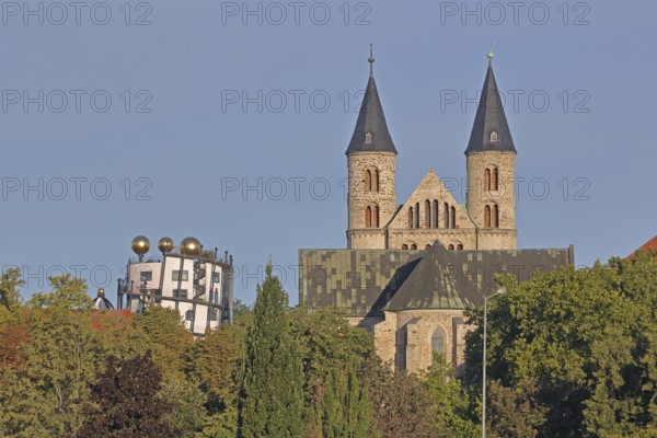 Green Citadel Hundertwasser House and Our Lady's Monastery, art museum, church, roof with golden sphere, twin towers, contrast, old, modern, architectural style, Magdeburg, Saxony-Anhalt, Germany