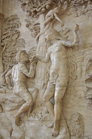 Decorations on the Renaissance pulpit by Christoph Kapup 1597 made of alabaster, Paradise with Fall of Man, stonemasonry, art, craftsmanship, interior view, biblical scene from the Bible 1st Moses, Genesis, Tree of Knowledge with Adam, Eve, snake, apple, figures, relief, sculpture, St Mauritius and St Katharina, Magdeburg Cathedral, Magdeburg, Saxony-Anhalt, Germany
