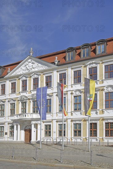 Baroque Winneberg Palace built in 1728 and Saxony-Anhalt State Parliament with EU flag, German national flag, city flag, Cathedral Square, Magdeburg, Saxony-Anhalt, Germany