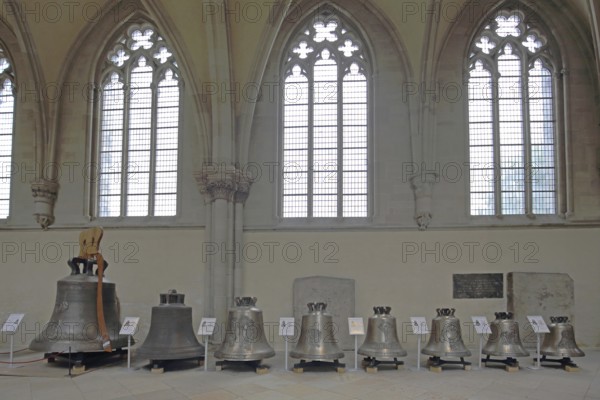 Series of bells exhibition, interior view, church bells, exhibits, St Mauritius and St Katharina, Magdeburg Cathedral, Magdeburg, Saxony-Anhalt, Germany