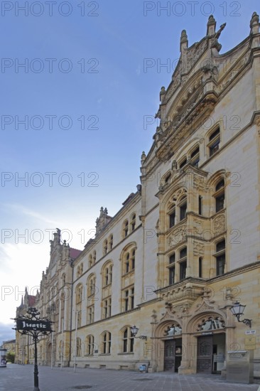 Historic labour court with sign for justice, entrance, portal, court building, Magdeburg, Saxony-Anhalt, Germany