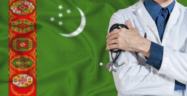 Doctor with stethoscope on Turkmenistan flag. Doctor holding stethoscope on Turkmen flag