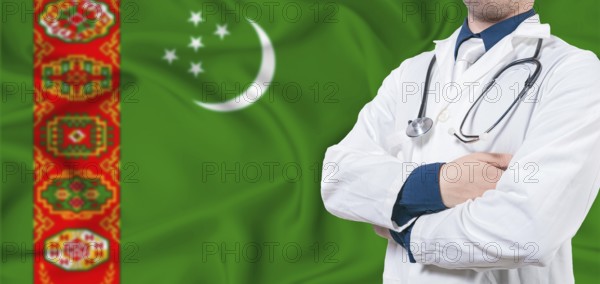 Turkmenistan healthcare concept. Male doctor on Turkmenistan flag. Doctor with crossed arms on Turkmenistan flag