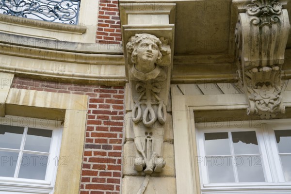 Traditional Westphalian Mettwurst sausage, detail on the facade of the Erbdrostenhof building, built by Johann Conrad Schlaun, Münster, North Rhine-Westphalia, Germany