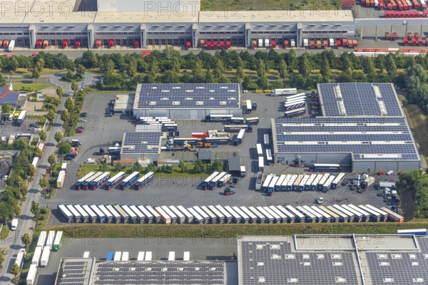 Aerial view, Werneke Logistic in the industrial estate Hansering Scheidinger Straße, Werl, Soester Börde, North Rhine-Westphalia, Germany, DE, Europe, aerial view, aerial photography, aerial photography, photovoltaic, photovoltaic plant, solar, solar plant, solar roof, solar energy, solar power plant, solar park, solar energy, overview, bird's-eye view, overview