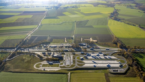 Aerial view, motorway A44 service area Am Haarstrang with construction site and expansion at Haarstrang-Nord in the district Westbüderich in Werl, Soester Börde, North Rhine-Westphalia, Germany, motorway A44, motorway service area, motorway service area, construction work, construction area, construction site, construction project, construction site, DE, Europe, truck parking, aerial view, aerial photography, aerial photography, new construction, parking, service area, overview, bird's eye view, Werl, birds-eyes view, overview
