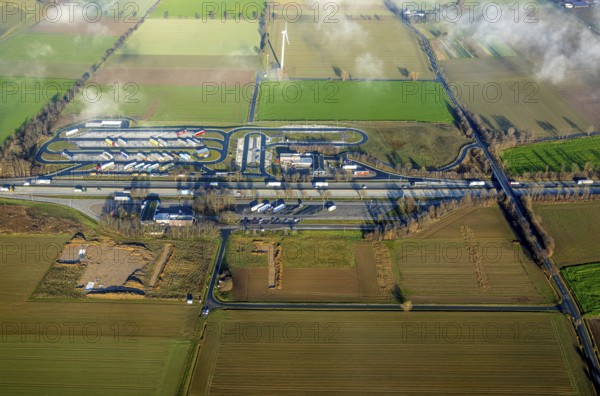 Aerial view, construction site and extension of the motorway service area Am Haarstrang of the A44 in the district Westbüderich in Werl, Sauerland, North Rhine-Westphalia, Germany, motorway A44, DE, Europe, aerial view, aerial photography, aerial photography, rest area, service area, overview, bird's eye view, Werl, meadows and fields, birds-eyes view, overview