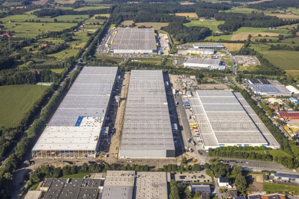 Spacious industrial complex with several large buildings and surrounding fields, aerial view Werl overview, Amazon distribution centre Werne, Werne, North Rhine-Westphalia, Germany