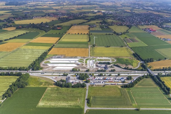 Aerial view, motorway A44 service area Am Haarstrang, construction site and new construction Haarstrang Nord, Westbüderich, Werl, Soester Börde, North Rhine-Westphalia, Germany, motorway A44, motorway service area, motorway service area, construction work, construction area, construction site, construction project, construction site, DE, Europe, truck parking, aerial view, aerial photography, aerial photography, new construction, service area, overview, bird's eye view, birds-eyes view, overview