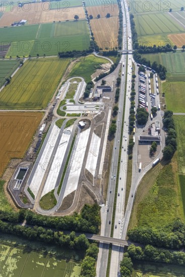 Aerial view, motorway A44 service area Am Haarstrang, construction site and new construction Haarstrang Nord, Westbüderich, Werl, Soester Börde, North Rhine-Westphalia, Germany, motorway A44, motorway service area, motorway service area, construction work, construction area, construction site, construction measure, construction project, construction site, DE, Europe, aerial view, aerial photography, aerial photography, new construction, service area, overview, bird's eye view, overview