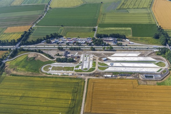 Aerial view, motorway A44 service area Am Haarstrang, construction site and new construction Haarstrang Nord, Westbüderich, Werl, Soester Börde, North Rhine-Westphalia, Germany, motorway A44, motorway service area, motorway service area, construction work, construction area, construction site, construction measure, construction project, construction site, DE, Europe, aerial view, aerial photography, aerial photography, new construction, service area, overview, bird's eye view, overview