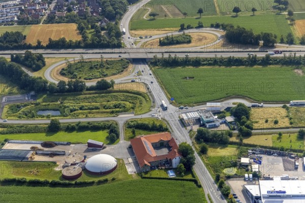 Aerial view, motorway exit Werl-Zentrum, A445, site Bioenergie Hellweg GmbH, Werl, Soester Börde, North Rhine-Westphalia, Germany, motorway, motorway A445, motorway exit, motorway slip road, Büdericher Bundesstraße, DE, Europe, commercial enterprises, commercial area, commercial area, commercial site, commercial use, industrial site, aerial view, aerial photography, aerial photography, overview, bird's-eye view, overview