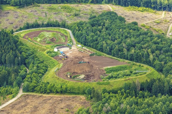 Aerial view, forest area with forest damage and construction site at Schörrenberg in the nature reserve Steinkuhle and Hillmickebach, Gerlingen, Wenden, Sauerland, North Rhine-Westphalia, Germany, construction work, construction area, construction site, construction measure, tree mortality, construction site, bark beetle damage, bark beetle plague, DE, Europe, clear-cutting, aerial photograph, aerial photography, aerial photography, overview, bird's-eye view, forest, forest damage, forest damage, forest mortality, birds-eyes view, overview