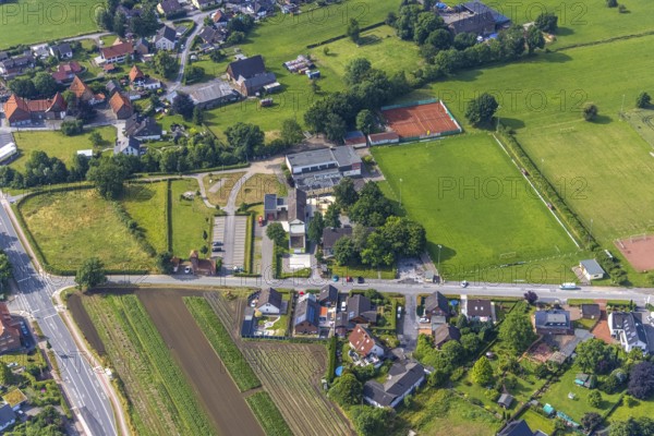 Aerial photo, Carl-Orff school, volunteer fire brigade, sports field SV Hilbeck, Hilbeck, Werl, Soester Börde, North Rhine-Westphalia, Germany, education, educational institution, fire fighter, fire protection, fire watch, DE, Europe, fire station, fire brigade, football pitch, football stadium, football club, educational institute, aerial photo, aerial photography, aerial photography, rescue station, school, sport, sports facilities, sports field, sports facility, overview, bird's eye view, bird's eye view, overview