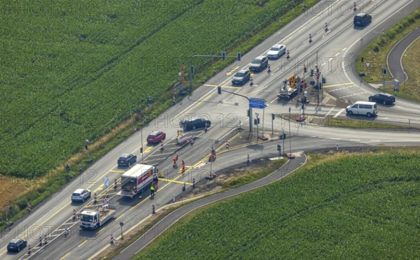 Aerial view, construction site and road works Hammer Landstraße and junction A445, Budberg, Werl, Soester Börde, North Rhine-Westphalia, Germany, construction works, construction area, construction site, construction measure, construction site, federal road B63, DE, Europe, aerial view, aerial photography, aerial photography, road construction measure, overview, bird's-eye view, overview