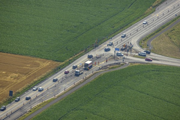 Aerial view, construction site and road works Hammer Landstraße and junction A445, Budberg, Werl, Soester Börde, North Rhine-Westphalia, Germany, construction works, construction area, construction site, construction measure, construction site, federal road B63, DE, Europe, aerial view, aerial photography, aerial photography, road construction measure, overview, bird's-eye view, overview