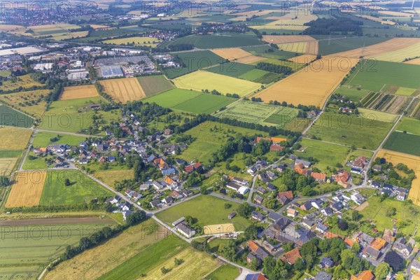 Aerial view, meadows and fields with view of Sönnern, Hammer Straße industrial estate, Werl, Soester Börde, North Rhine-Westphalia, Germany, DE, Europe, commercial enterprises, commercial area, industrial estate, business park, commercial location, commercial use, property tax, real estate, industrial area, industrial building, industrial location, aerial view, aerial photography, aerial photography, overview, bird's-eye view, meadows and fields, living, residential buildings, quality of life, bird's-eye view, overview